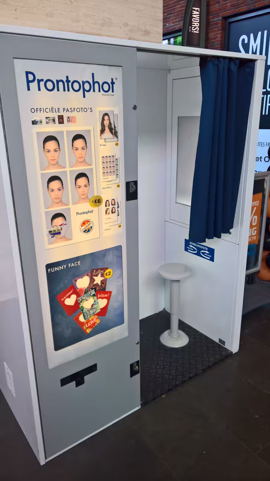 A dedicated photo booth setup used to capture compliant visa/ID photos (generic example).